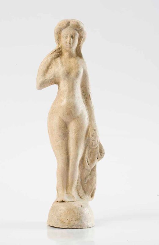 Figurine votive en terre cuite blanche de l’Allier (Vénus anadyomène), époque gallo-romaine.