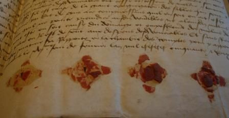 Quatre signets du XVe siècle (1457, 1 G 28)